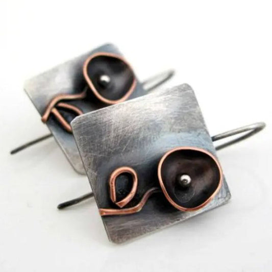 Pendientes geométricos florales hechos a mano | metal con personalidad.