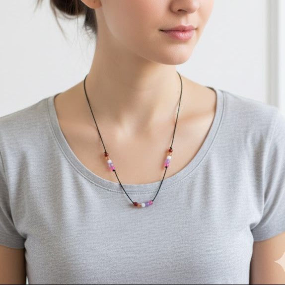 Collar colores de la bandera lesbiana, Imagen de referencia creada con IA